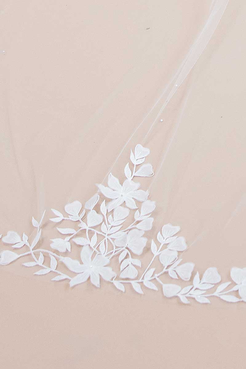 Closeup embroidered flower edging on the Nera 3D Cathedral Veil by Laura Jayne.