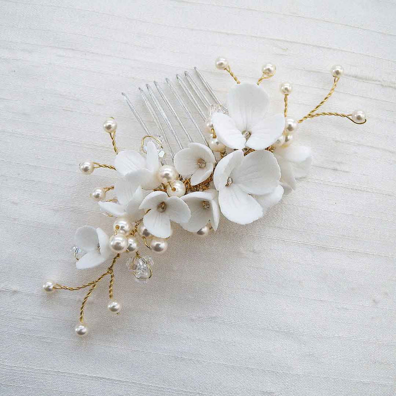 White and gold floral crystal and pearl bridal hair comb accessory. 