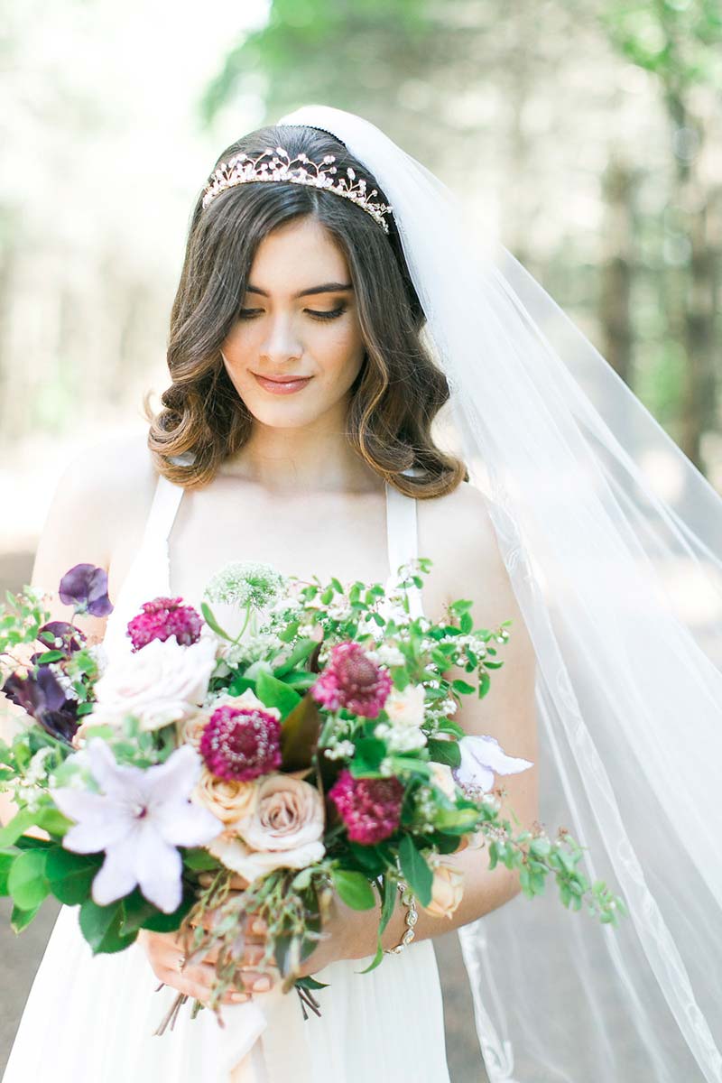 Styled image of bride wearing organic vine tiara