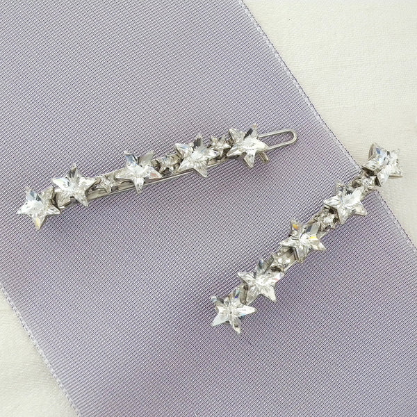 Pair of celestial crystal star barrettes by Laura Jayne Accessories