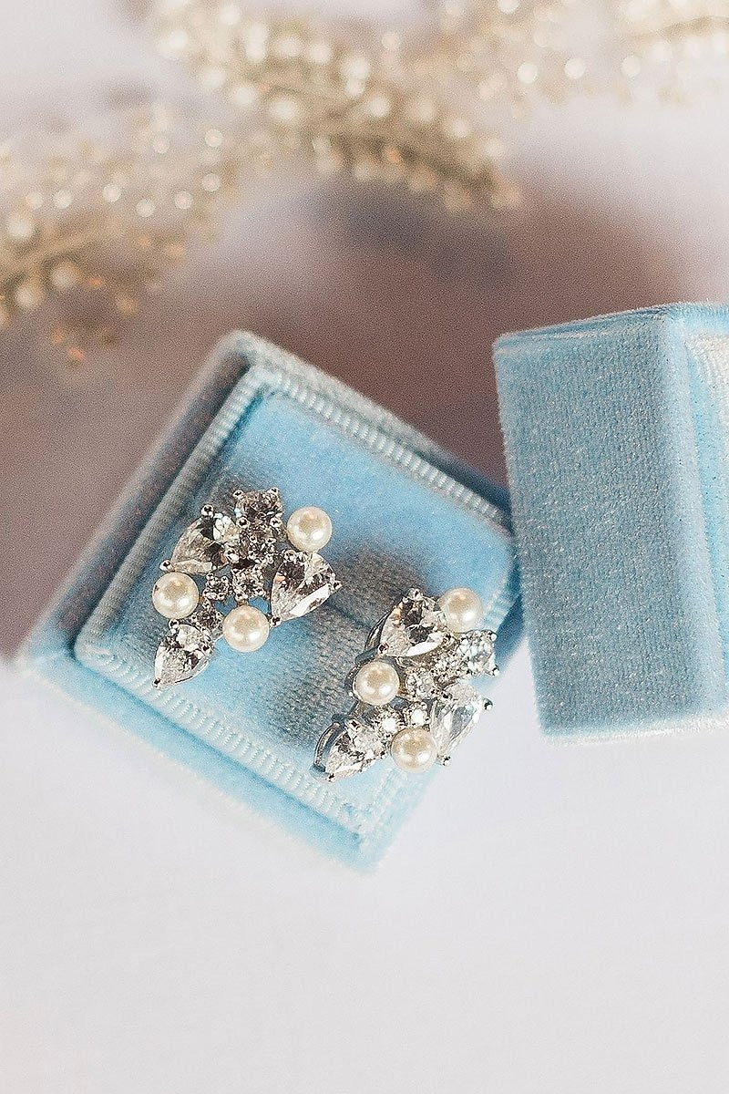 pearl crystal earrings in blue ring box
