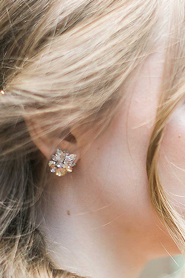 Close up of woman wearing marquis crystal champagne earrings E3033 by Laura Jayne Accessories