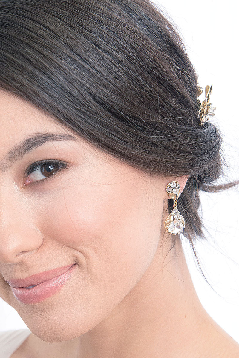 Bride wearing wedding day crystal bridal earring. Handmade in Toronto.