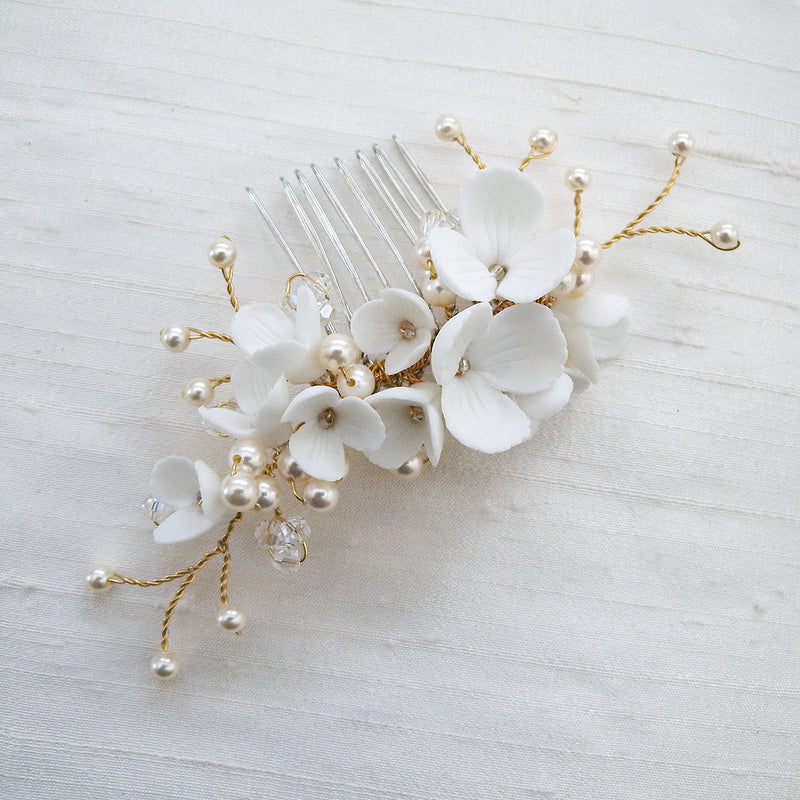 White and gold floral crystal and pearl bridal hair comb accessory. 