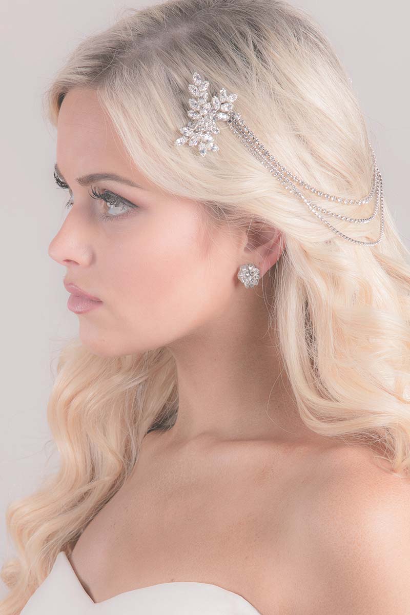 Profile of bride wearing Harmony crystal wedding hair accessory by Laura Jayne