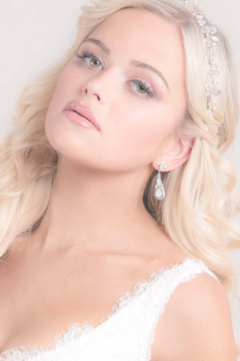Bride wearing opal drop wedding earrings E7026 by Laura Jayne Accessories
