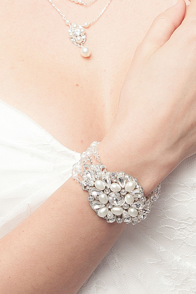 Laura Jayne statement pearl and crystal wedding bracelet on models arm