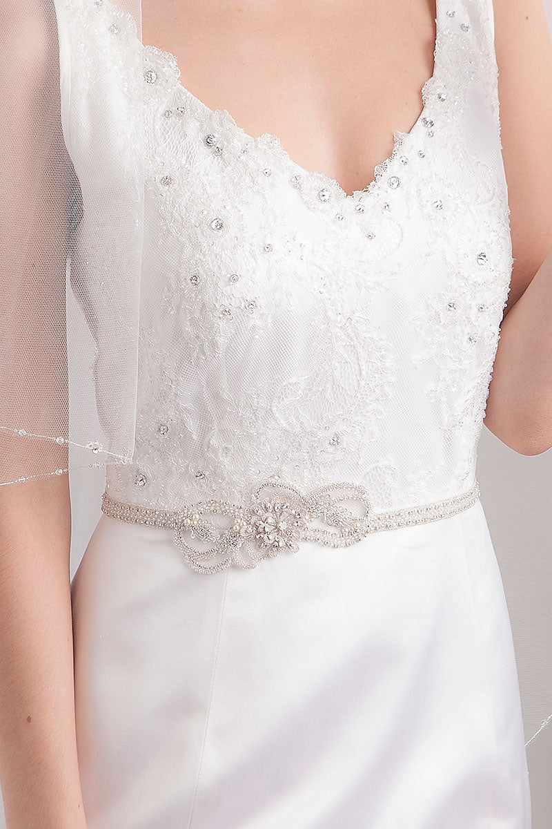 Close up of womans torso wearing Lourdes wedding belt by Laura Jayne Accessories
