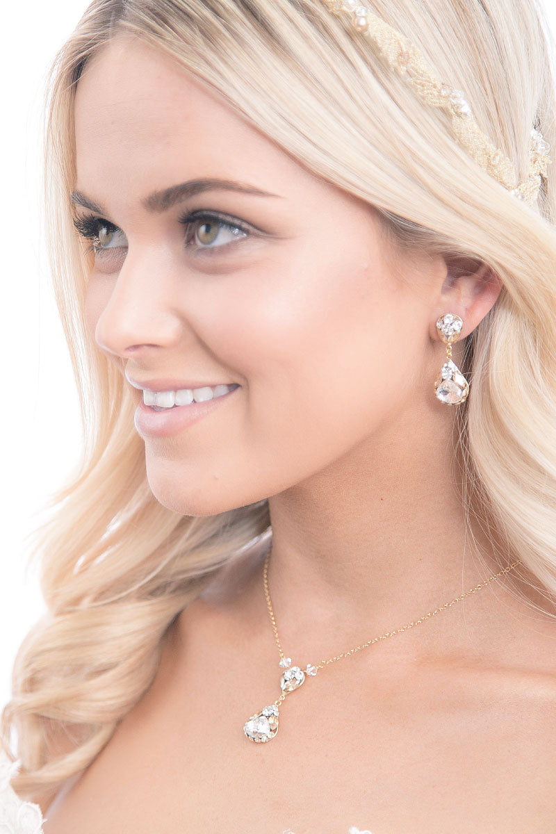 Woman wearing pear crystal teardrop necklace by Laura Jayne Accessories