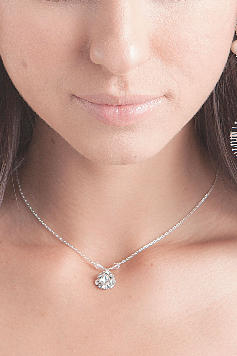 Laura Jayne N7018 crystal teardrop neckace closeup on womans neckline
