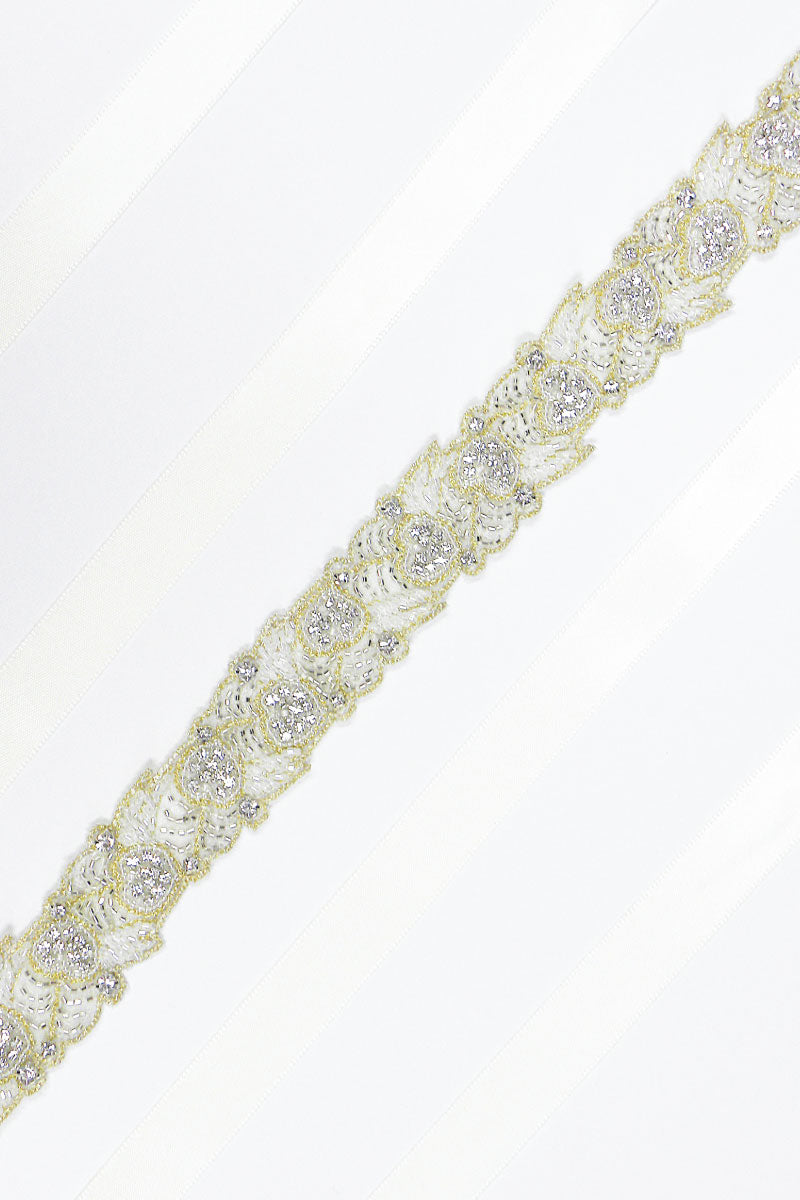 Detail of Verde gold leaf bridal belt by Laura Jayne Accessories