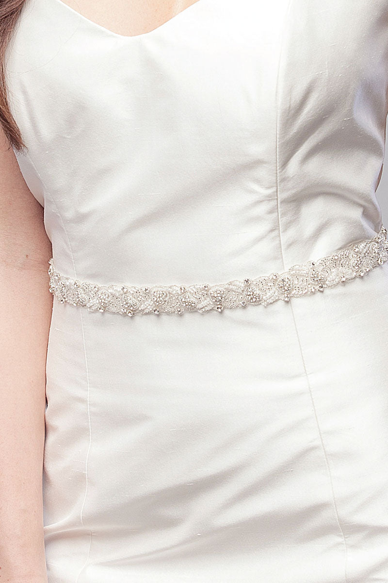 Laura Jayne Verde silver sash on woman's torso