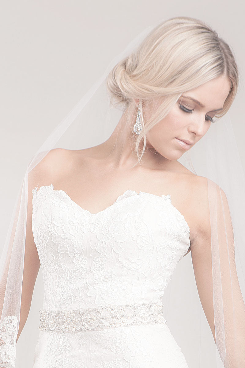 Bride wearing Athens beaded rondelle wedding belt by Laura Jayne handcrafted in Toronto