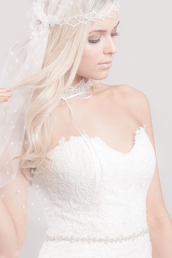 Bride wearing matte crystal bridal belt by Laura Jayne accessories in Toronto