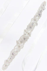 Product shot of silver leaf wedding sash Trista by Laura Jayne Accessories