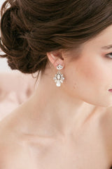 Profile of bride wearing opal pear crystal statement earrings E9084 by Laura Jayne Accessories