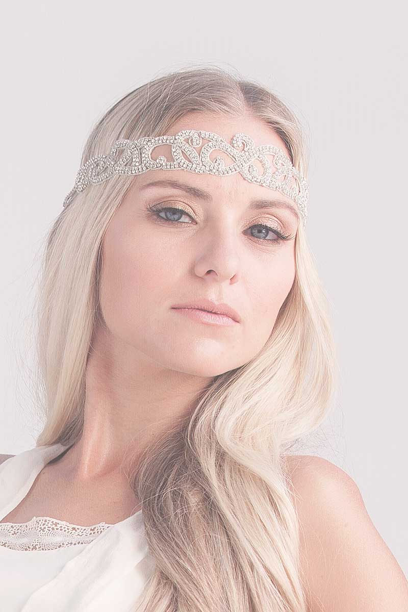woman wearing crystal headband across forehead