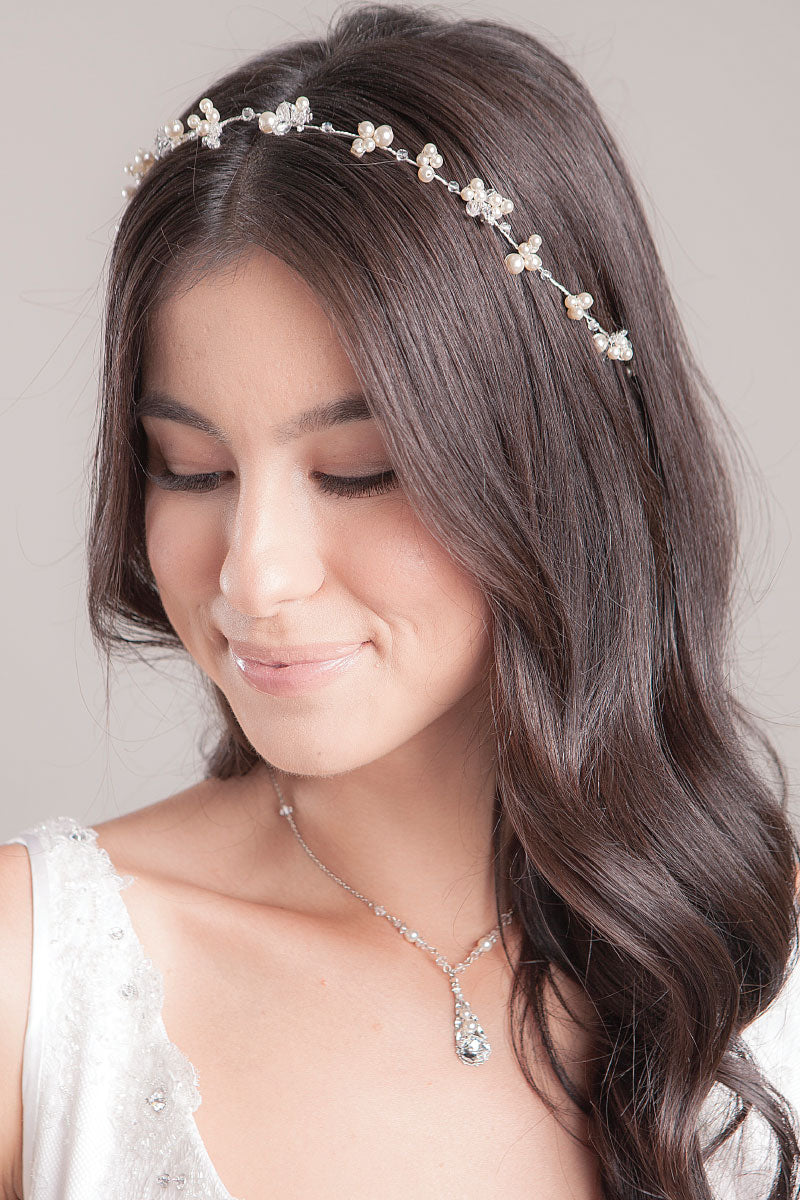 Woman wearing silver crystal hairvine