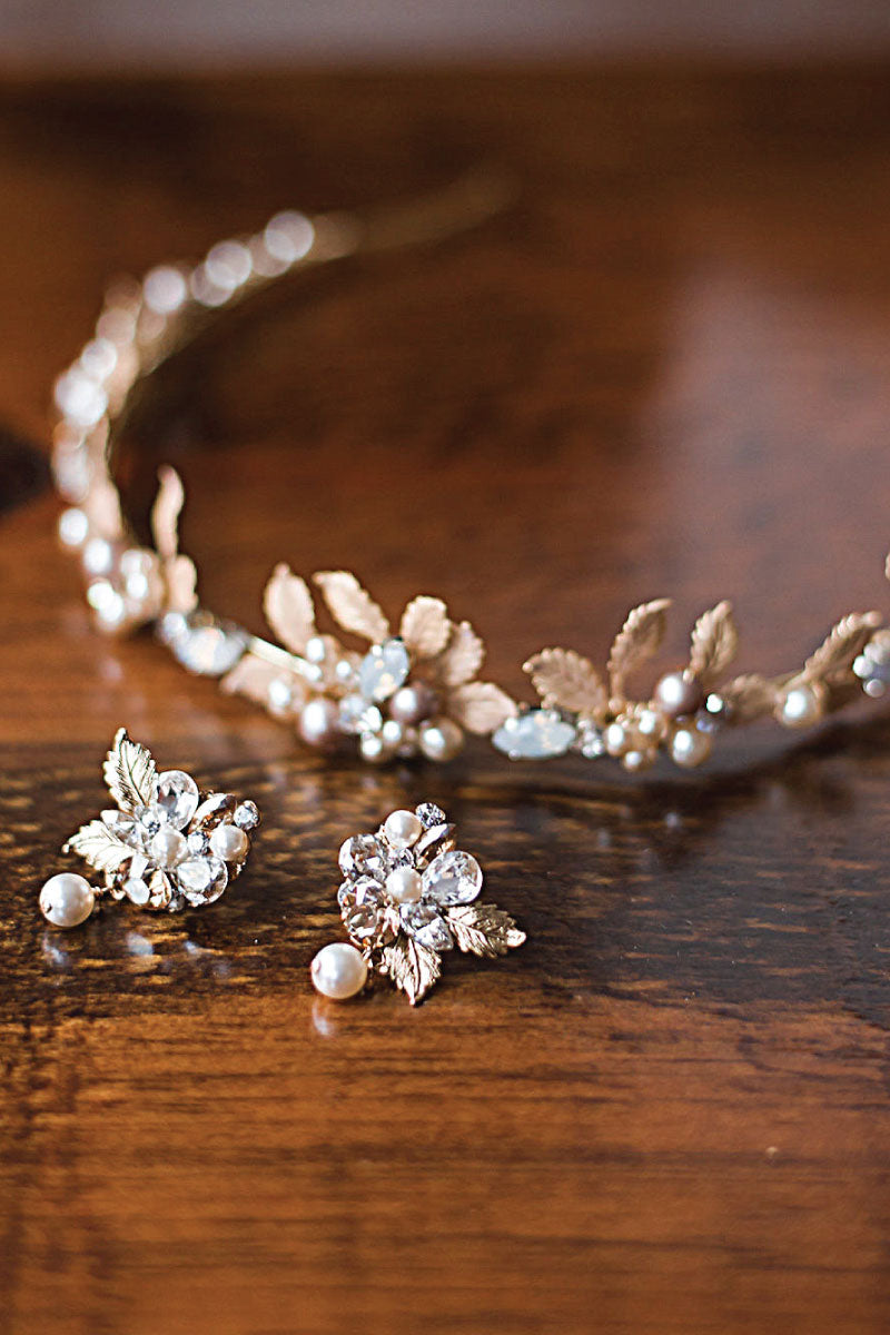Closeup view of gold leaves, mocha pearls and marquis crystals that adorn the Bliss Leaf Pearl Tiara by Laura Jayne. Handcrafted in Toronto, Canada.