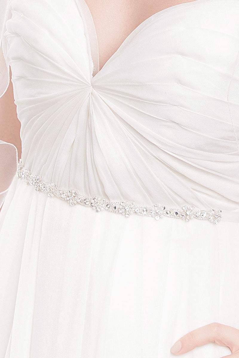 Laura Jayne Aurora hair ribbon worn as wedding dress belt on model
