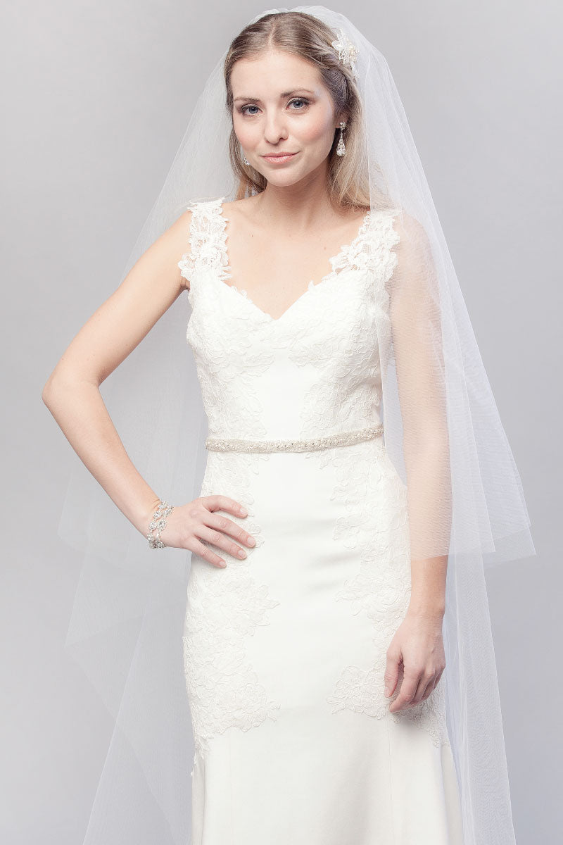 Classic bride wearing timeless Mae Cathedral Veil with blusher by Laura Jayne Accessories Toronto. Handcrafted in Canada.