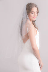 woman with short wedding veil